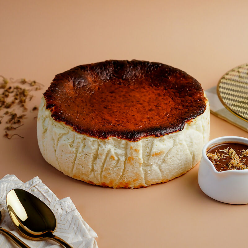 Basque Cheesecake Whole with Chocolate Kunafa Sauce 800x800